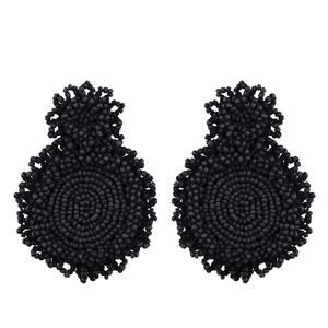 Handmade black seed bead earrings in bohemian style with layered circular drop design