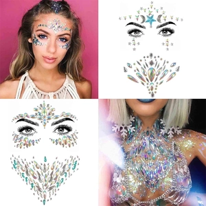 Detailed holographic face jewels and body gems in star and moon shapes for creative makeup