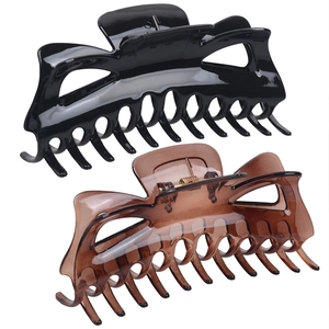 Large matte black and translucent brown hair claws for thick hair with strong metal springs