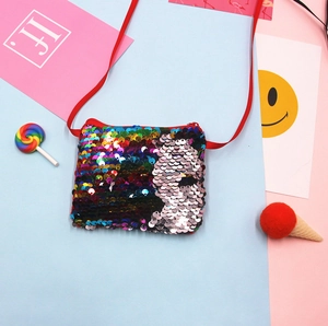 Colorful mermaid sequin kids crossbody bag detail with cute candy and smiley props.