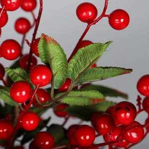 Artificial red berry stems with green leaves for Christmas wreaths and DIY home decoration