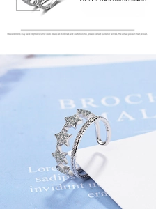 Detail view of double-layer silver star ring showing adjustable 17mm inner diameter