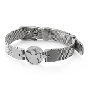 Silver stainless steel mesh bracelet featuring a delicate flower charm with adjustable clasp