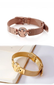 Mesh band bracelets with hollow floral locket in rose gold and gold plating finish