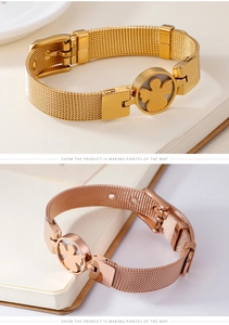 Detail of mesh strap bracelets in gold and rose gold with angel shell charms