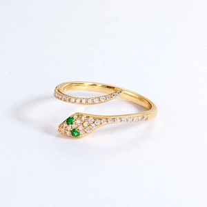 Minimalist S925 sterling silver snake ring with green stone eyes and clear gems in gold finish