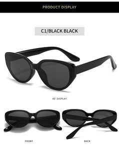 Detailed views of vintage black cat-eye sunglasses showing front and side profile angles