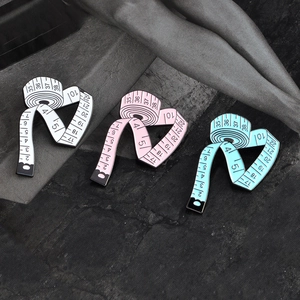 Creative heart-shaped measuring tape enamel brooch set in white, pink, and blue colors