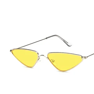 Retro small cat-eye sunglasses with yellow tinted lenses and silver metal frames