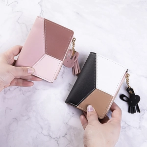 Detail of color-block PU leather wallets with tassel zipper and rabbit charm