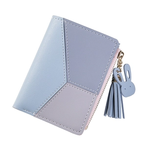 Detail of color-block wallet with lychee pattern PU leather and tassel rabbit pendant