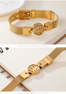 Détail du bracelet couronne doré avec maille milanaise et boucle de montre ajustable