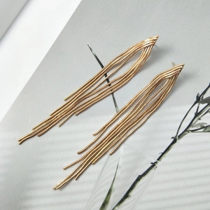 Elegant gold-tone geometric metal tassel drop earrings featuring dense snake chain fringes