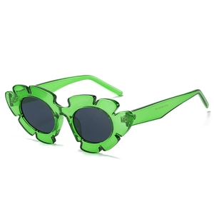 Green flower shaped translucent sunglasses with round dark lenses for women and kids