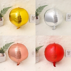 Detail view of 18 inch 4D round foil balloons in gold, silver, rose gold and red