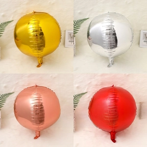 Detail of 22-inch 4D aluminum foil balloons in gold, silver, rose gold, and red finishes