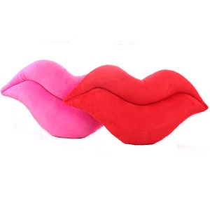 Plush red and pink lip-shaped decorative throw pillows for home and office decor