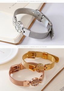 Macro shot of stainless steel mesh bracelets with Tree of Life charms in gold and silver
