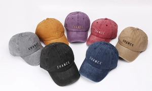 Detailed group view of washed cotton baseball caps in seven colors with CHANCE embroidery