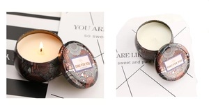 Detailed comparison of lit and unlit scented soy wax candles in floral tin containers