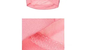 Detailed macro view of pink knit pet vest showing premium stitching and fabric texture