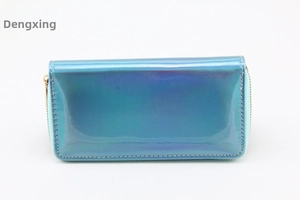 Detail of colorful laser PU long wallet featuring a vibrant blue iridescent finish and gold zipper