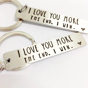 Polished stainless steel bar keychain with I LOVE YOU MORE THE END engraving for couples