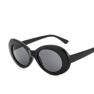 Classic black oval sunglasses with polished frames and dark lenses for women