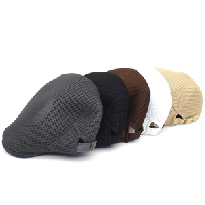 Detail of breathable mesh berets in multiple colors with adjustable metal buckles