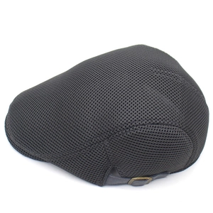 Detailed view of the breathable mesh fabric and adjustable metal buckle on back of cap