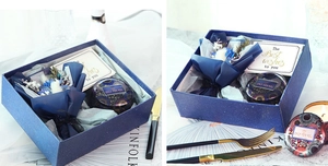 Navy starry aromatherapy soy candle set with dried flowers and gift card in a premium box