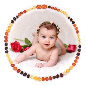 Handcrafted Baltic amber necklace for babies with polished beads in mixed warm tones
