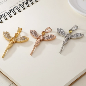 Creative angel wing pendants with inlaid diamonds and engraved heart-shaped yellow gems