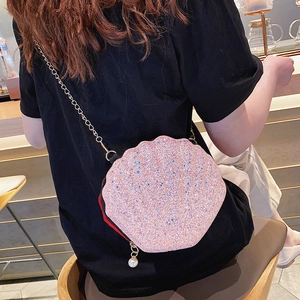 Pink sequin shell-shaped crossbody bag for women with gold chain and pearl tassel