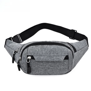 Close-up of gray Oxford fabric messenger bag with adjustable strap and buckle details