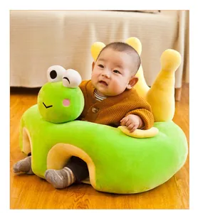 Detail of baby plush frog training seat with soft support for learning to sit safely