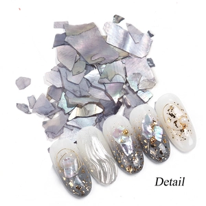Irregular purple iridescent shell flakes for nail art with gold leaf and pearl accents