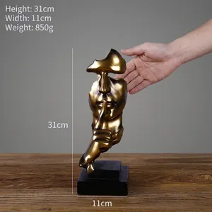 Sculpture dorée antique Le silence est d'or montrant 31cm de haut et 11cm de large