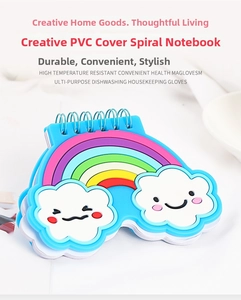 Close-up of rainbow spiral notebook with PVC cover and cute smiling cloud details