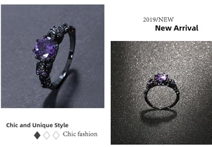 Macro shot of gothic black skull ring featuring a large purple round zircon center stone
