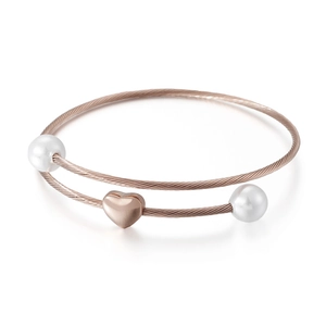 Rose gold pearl bracelet featuring a matte heart pendant on a spiral steel wire band