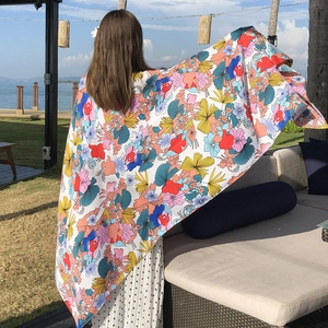 Floral cotton linen beach shawl with tropical plant prints for summer seaside holidays