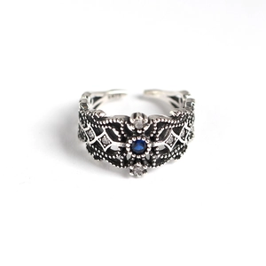 Vintage S925 sterling silver hollow ring with oval blue stone and small diamonds