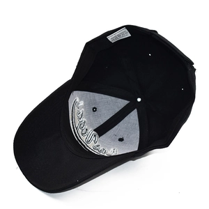 Internal view of Los Angeles camo baseball cap showing 100% acrylic material and label
