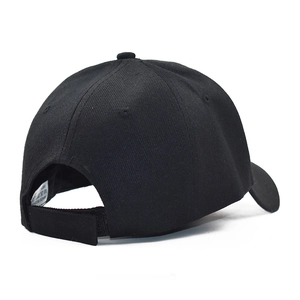 Rear view of black cotton baseball cap featuring adjustable velcro strap and white label