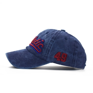 Navy blue washed cotton baseball cap with vintage embroidery and adjustable strap