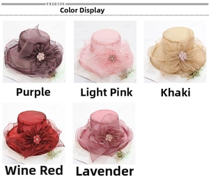 Detail view showing five elegant organza sun hats with handmade flowers and pearl accents