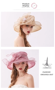 Detail of elegant organza sun hat featuring 3D floral accents and wavy brim texture