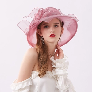 Pink organza summer sun hat with large floral detail and wide brim for elegant beach wear