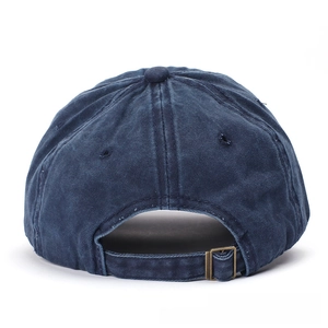 Detail view of washed navy denim baseball cap with an adjustable vintage metal buckle